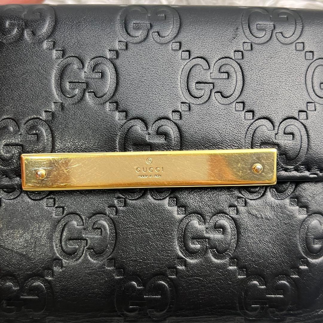 グッチ　シマ　折り財布　ロゴプレート　ブラック　　メンズ　レディース