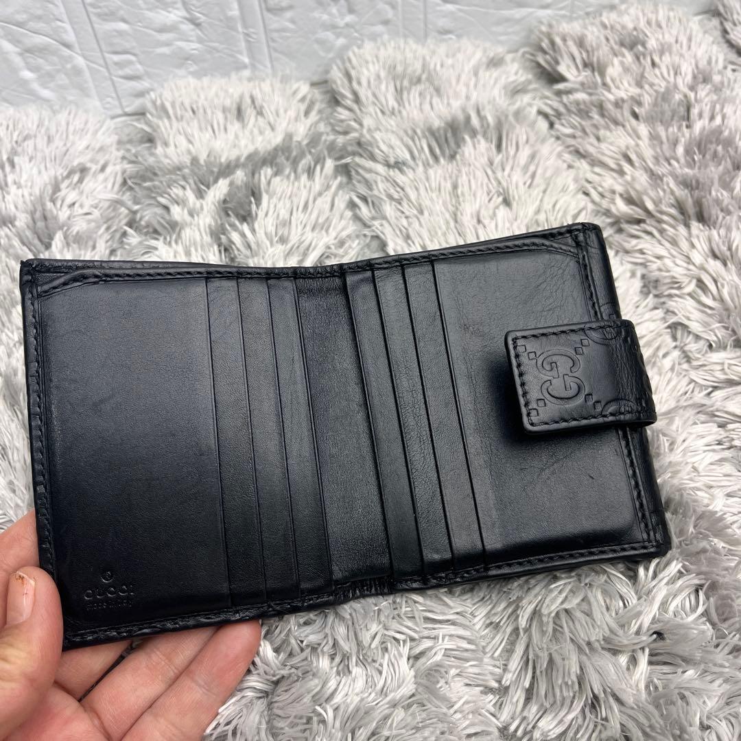 グッチ　シマ　折り財布　ロゴプレート　ブラック　　メンズ　レディース