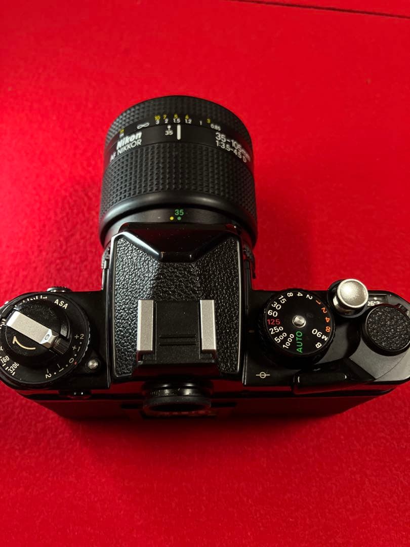 衝撃　超美品　ニコンＦＥ　35-105mmズ-ム付き　新品モルト交換済み