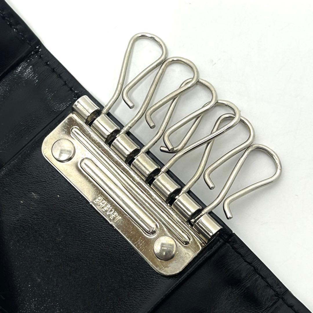 プラダ 6連キーケース サテン トライアングルロゴ レザー 黒 シルバー ロゴ