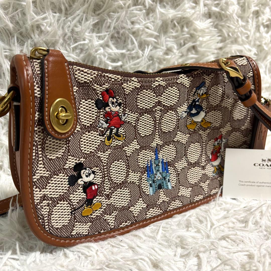 ✨極美品/50周年限定品✨コーチ×ディズニー スゥインガーバッグ ターンロック