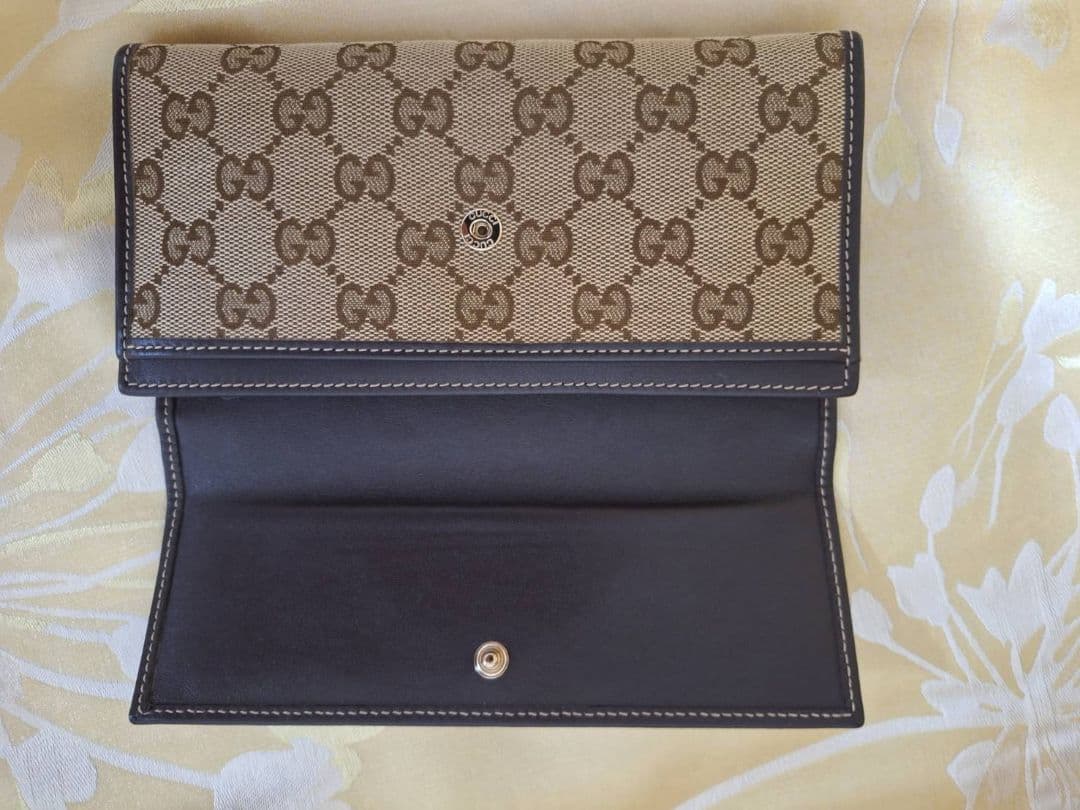 せ*ン様 GUCCI 二つ折り財布 GGパターン