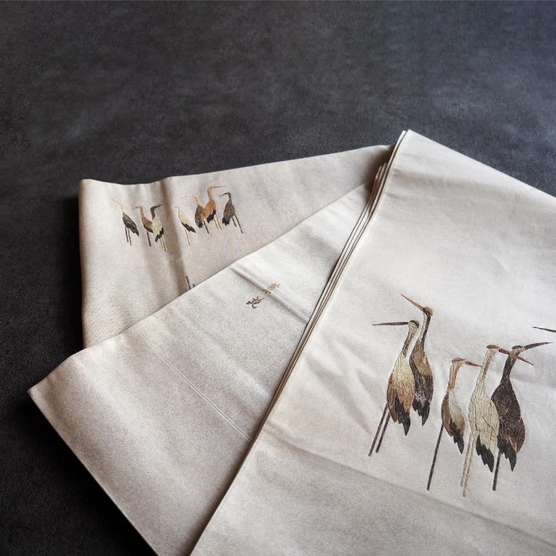 みの虫工芸作家　草苑白水　太鼓柄袋帯　群れ立ち鶴　正絹　逸品　ベージュ