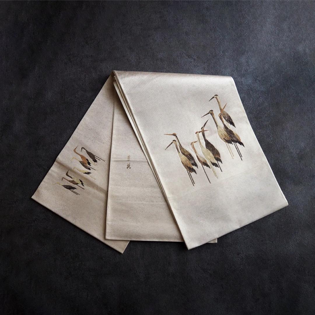 みの虫工芸作家　草苑白水　太鼓柄袋帯　群れ立ち鶴　正絹　逸品　ベージュ