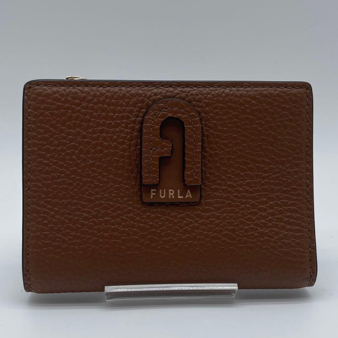 未使用　FURLA 二つ折り財布　ダフネ　アーチロゴ