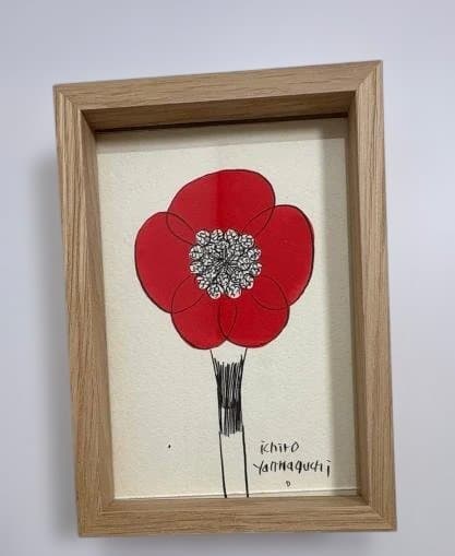 鮮やかな赤いカラーが印象的な原画