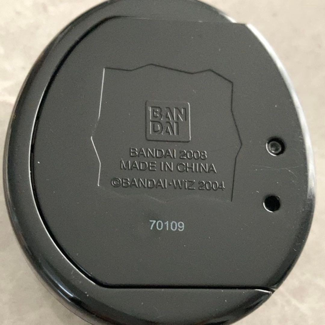 Tamagotchi + Color 2008年製　と攻略本、フィギュア3体