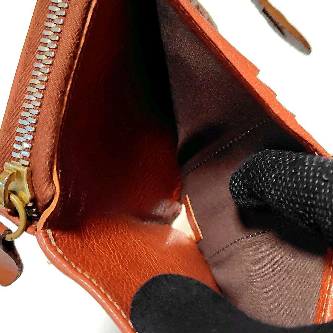 イルビゾンテ　折り財布　ブラウン　レザー　ラウンドファスナー　型押し　金ボタン