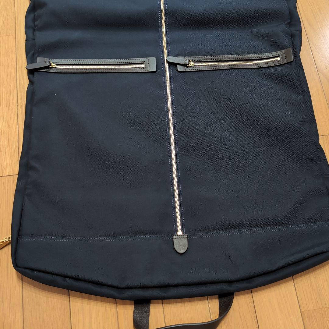 MISMO ミスモ ナイロンガーメントバッグ