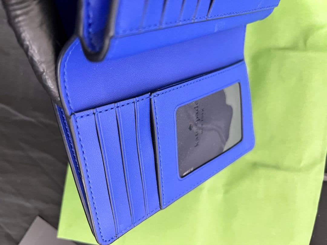 ケイトスペード 二つ折り財布 kate spade シュイラー ウェーブ ストラ