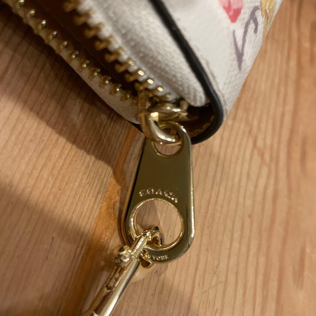 花柄デザインの長財布　コーチ　coach