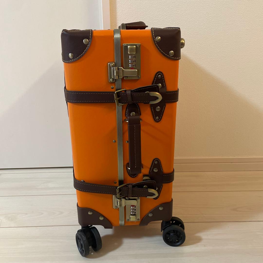 キャリーケース　トランク　スーツケース　オレンジ　旅行