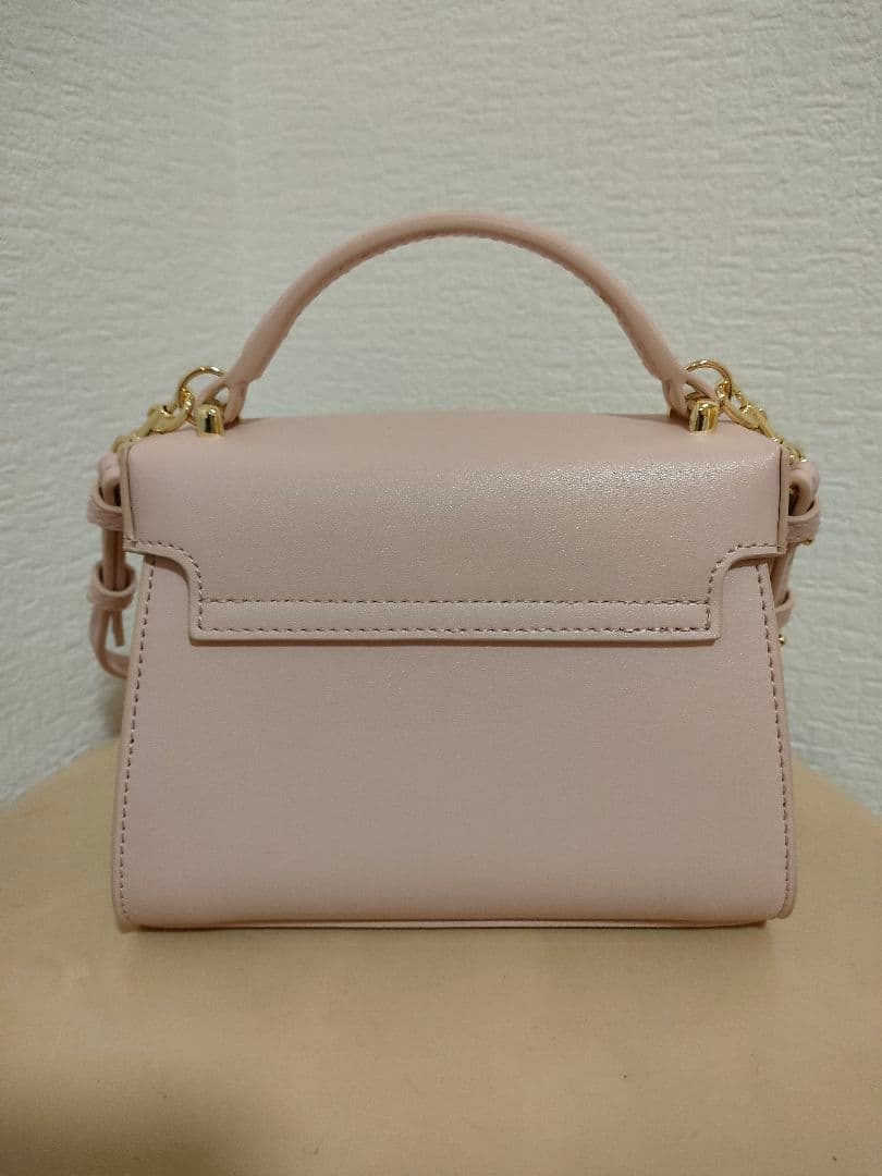 セルフォード　リュタンビジュースタッズポシェット　ピンク