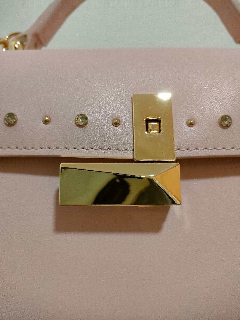 セルフォード　リュタンビジュースタッズポシェット　ピンク