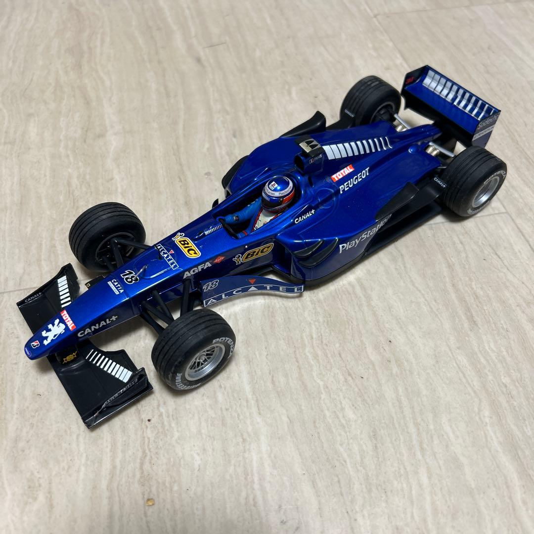ミニチャンプス　1/18 Prost Peugeot AP02 1999
