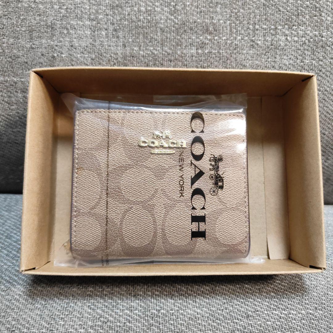 【訳あり】COACH C3309 Cチャーム シグネチャー 二つ折り財布