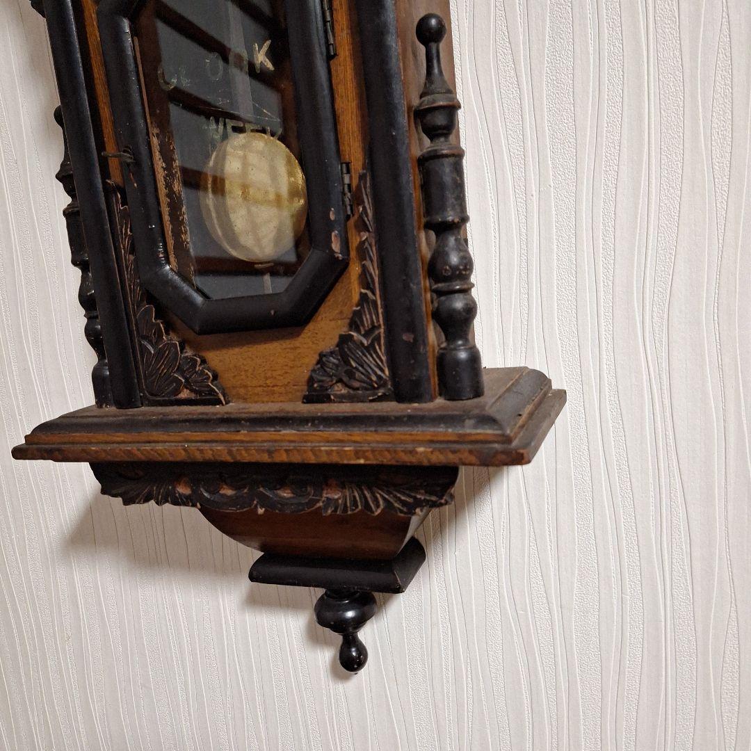 324 彫刻入り振り子掛時計　小型ひまわり柱時計