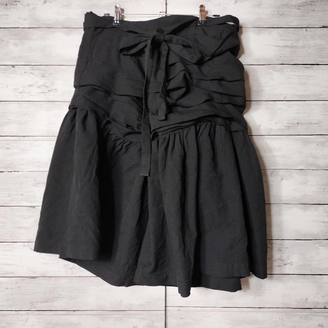 コムコム コムデギャルソン ポリエステル縮絨 巻きスカート ひざ丈 フリル