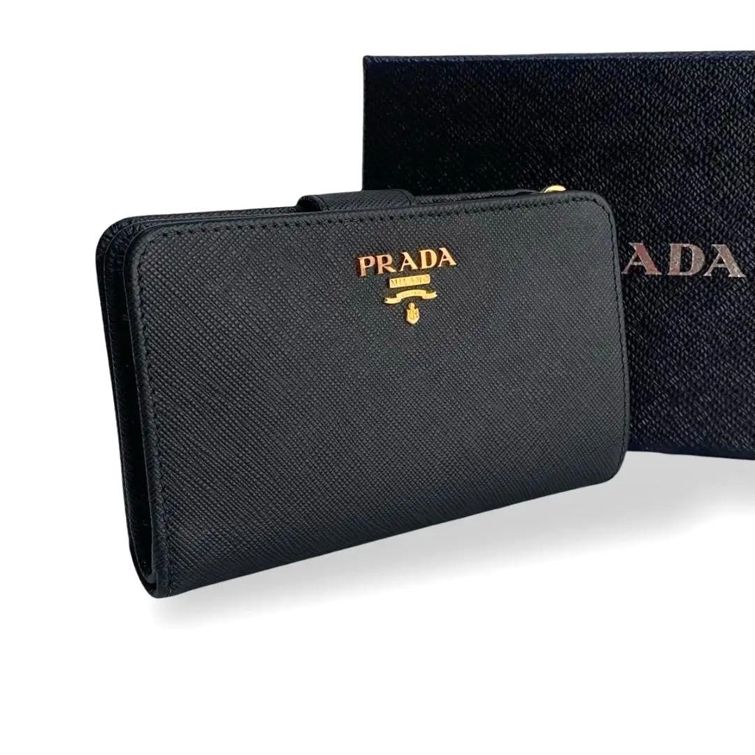 プラダ　二つ折り財布　ネイビー　レディース