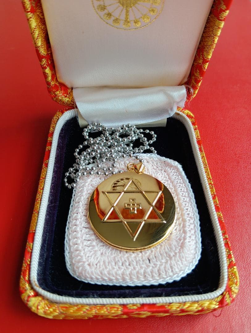 真光ペンダント、ネックレス、バッジ、ペンダントケース、ニュース記事