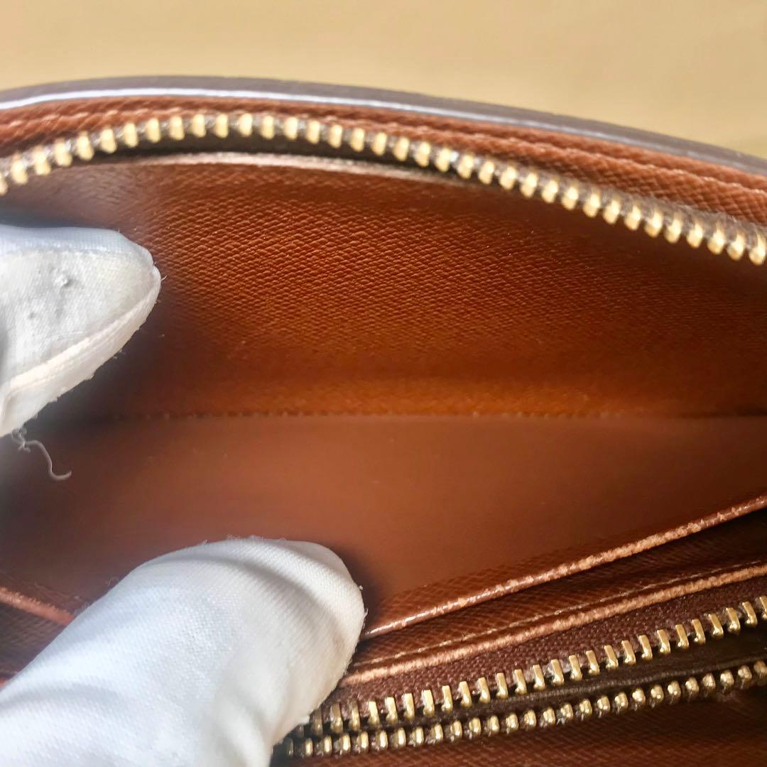 ルイヴィトン　モノグラムポルトモネジップ　ラウンドファスナー　二つ折り長財布