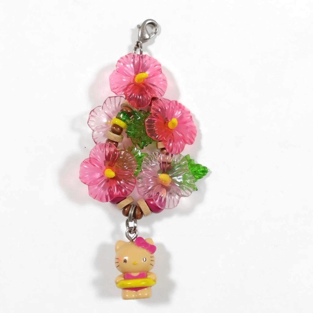 ハローキティ■夏が好き　日焼け　浮輪　水着　ハイビスカス　ファスナーマスコット