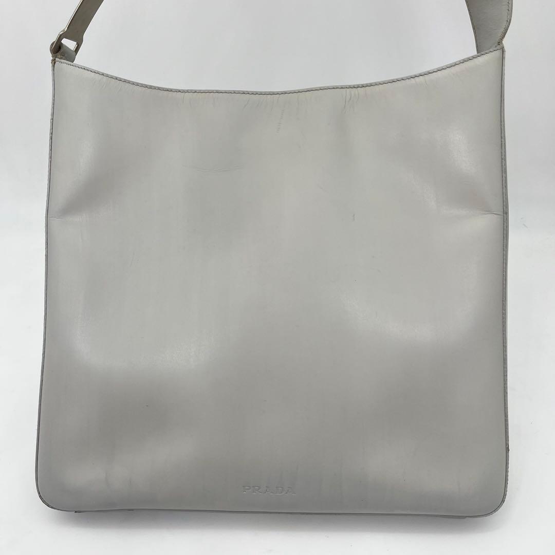 PRADA ワンショルダーバッグ 肩掛け ロゴ金具 カーフレザー オフホワイト