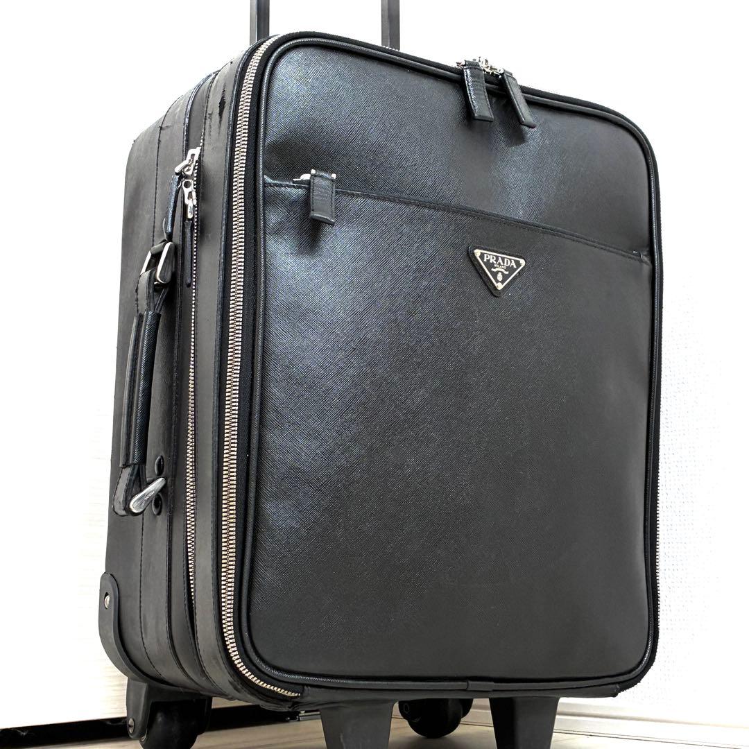 正規品 プラダ キャリーケース 三角ロゴ 白タグ サフィアーノレザー メンズ 黒
