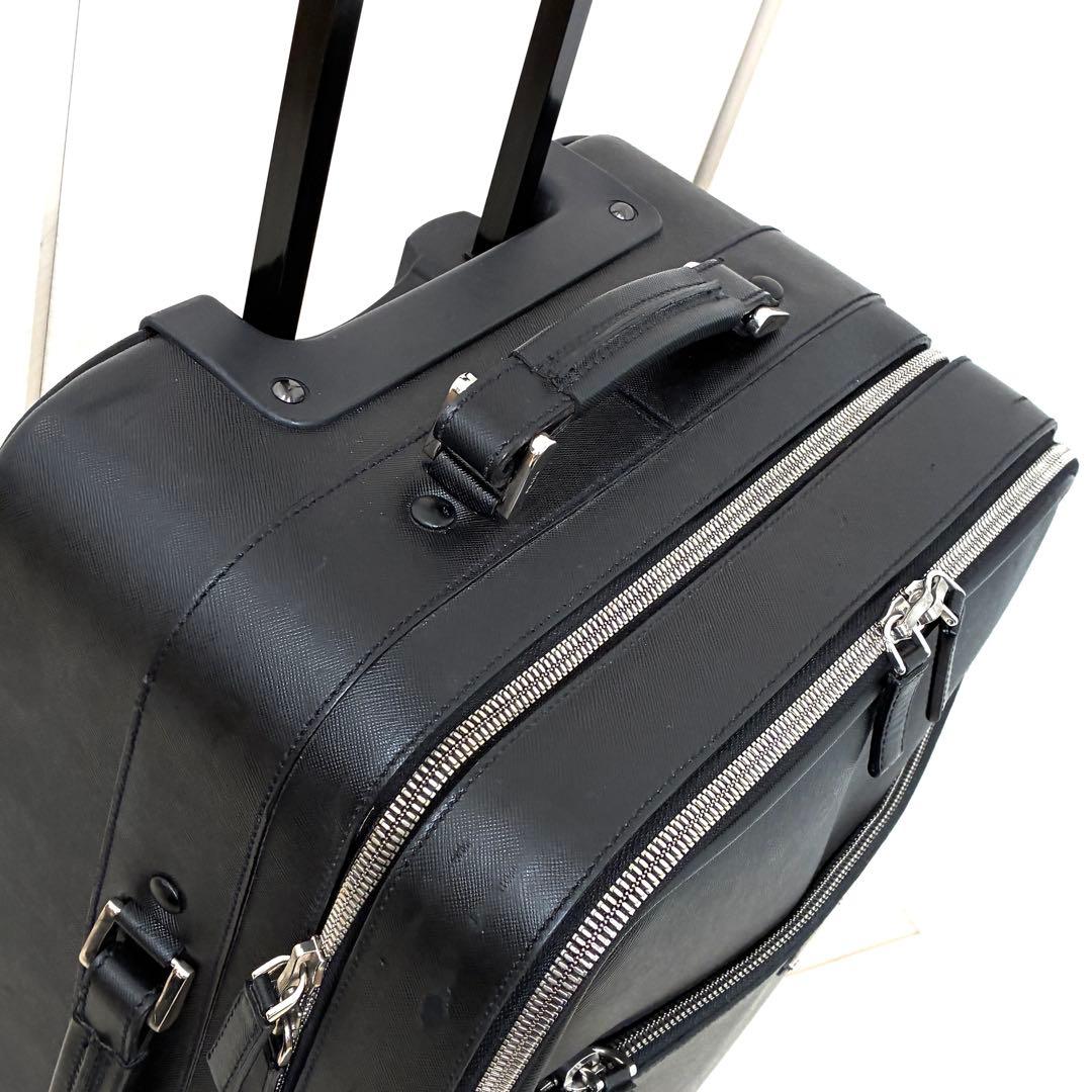 正規品 プラダ キャリーケース 三角ロゴ 白タグ サフィアーノレザー メンズ 黒