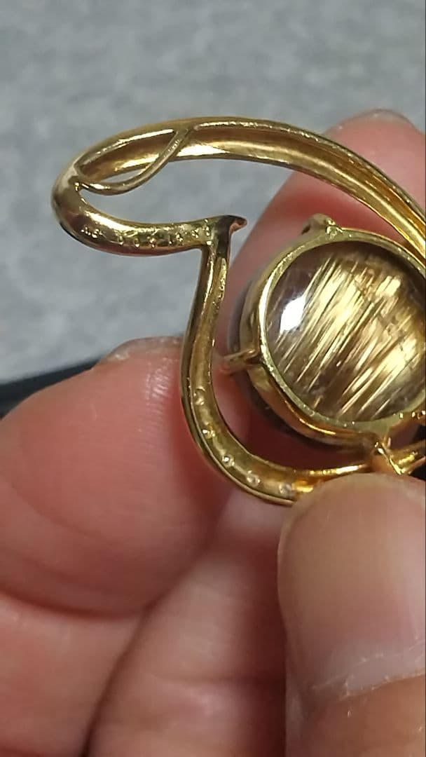 14.50ブラウンルチルキャッツアイダイヤ0.07入りk18ペンダントトップ