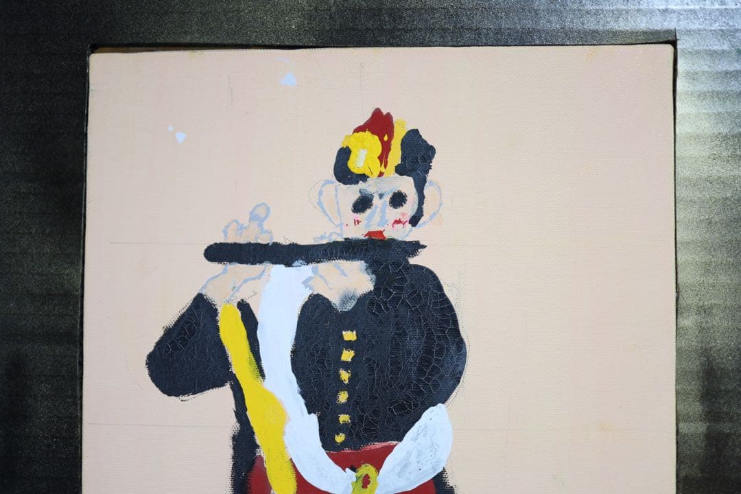 小学生が描いた「笛を吹く少年」