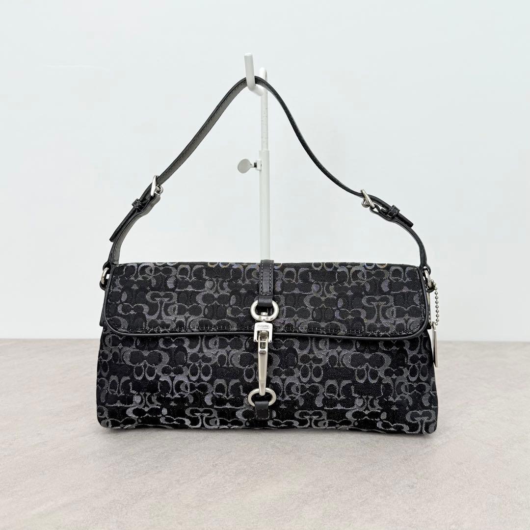 バッグ Coach Black Signature Soft Clip Pouch