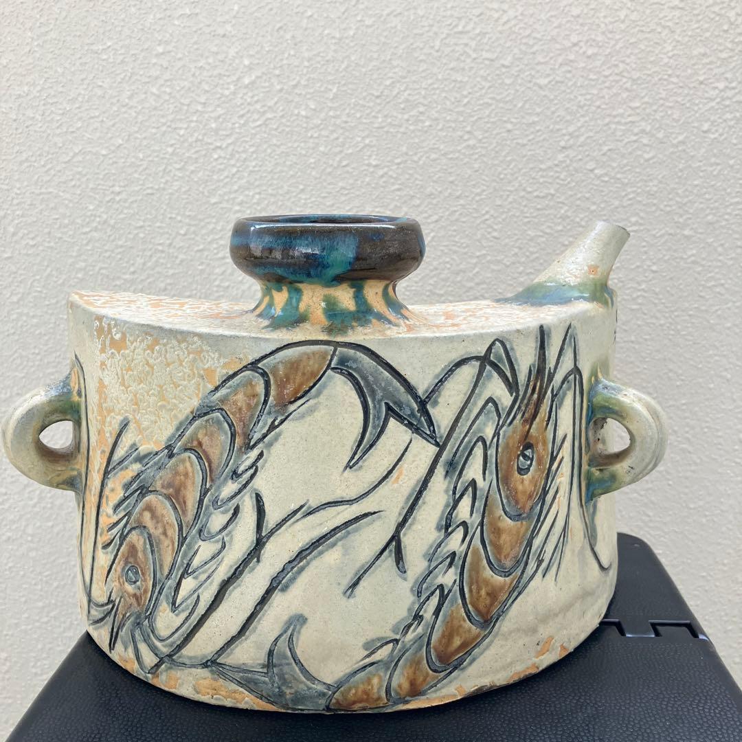 金城次郎　抱瓶