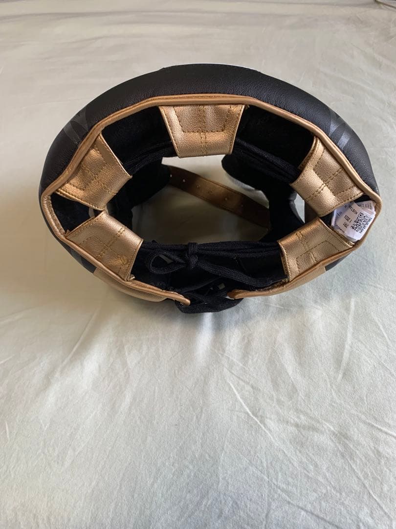 RIVAL ヘッドギア 黒/金 耳保護付き