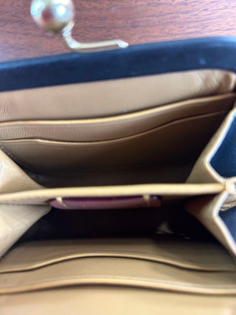 COACHコーチ黒のがま口ケース小銭に入れ