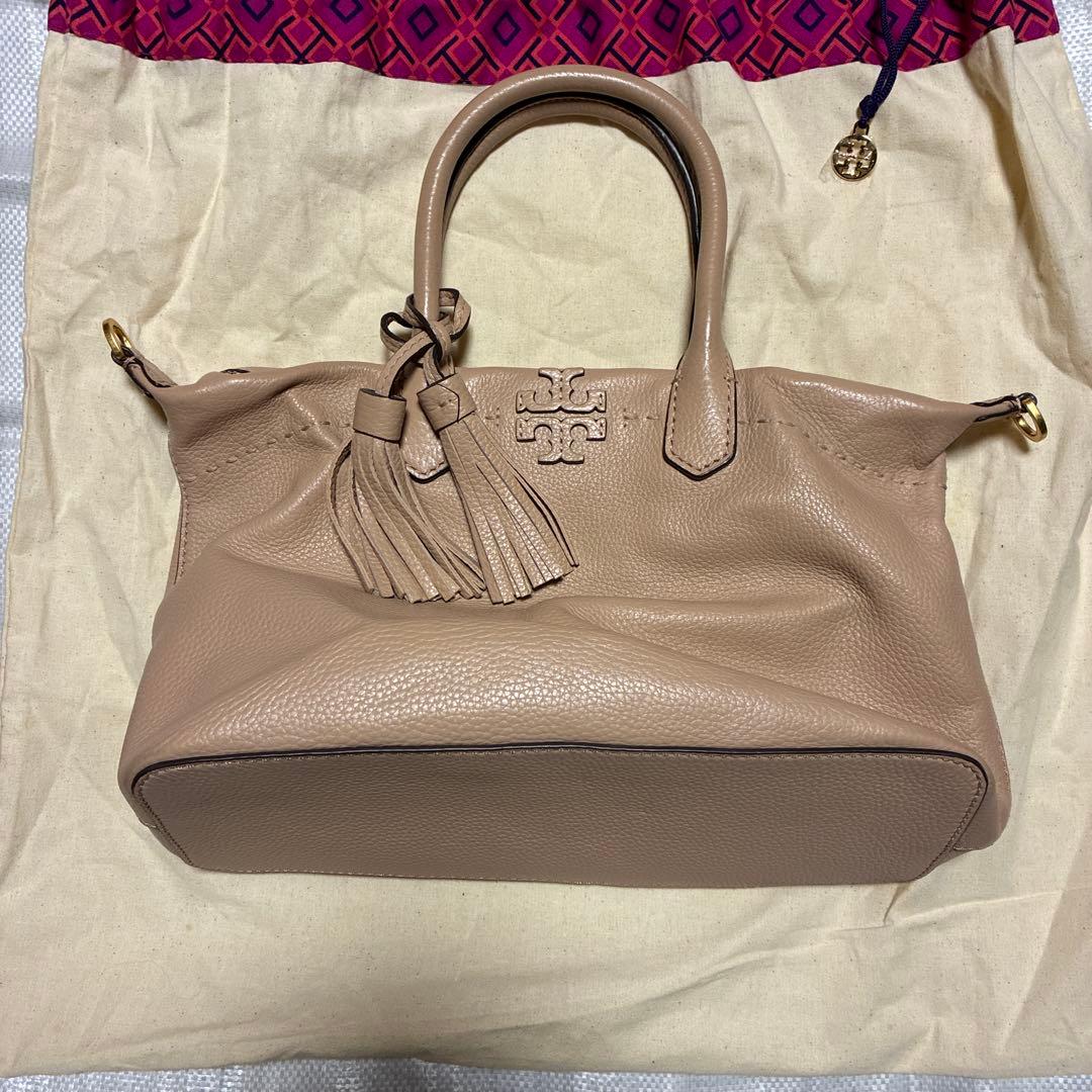 くまちゃんToryBurchピンクベージュハンドバッグタッセル付き