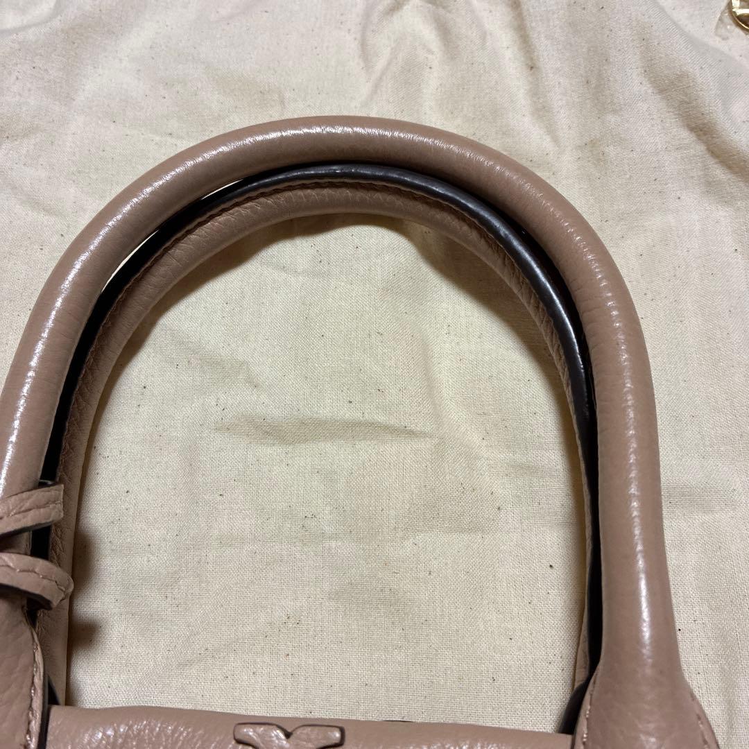 くまちゃんToryBurchピンクベージュハンドバッグタッセル付き