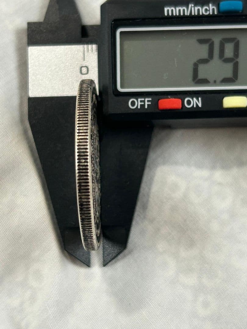 貿易銀　明治七年製