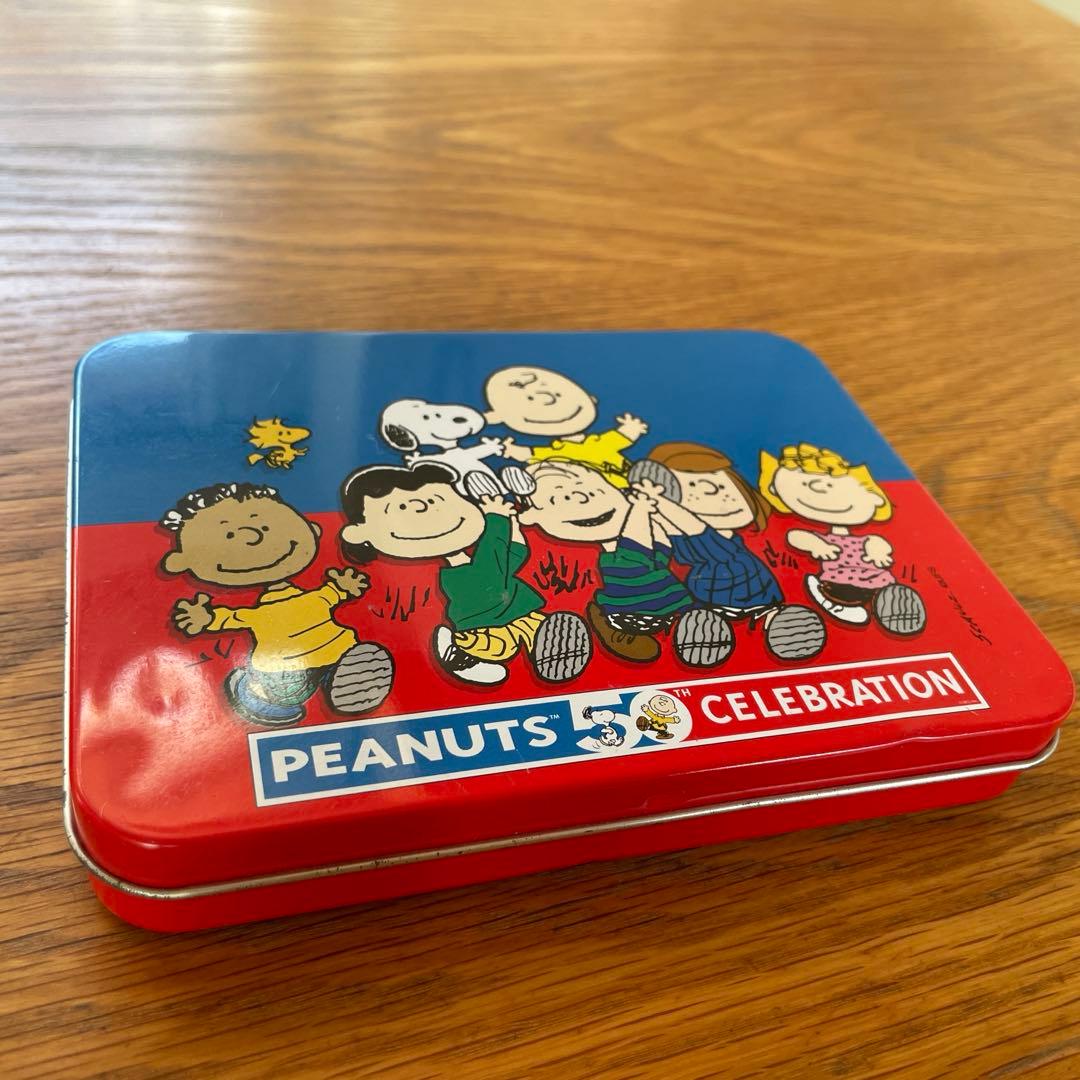 ピーナッツ生誕50周年記念アニバーサリーコレクター缶（トランプ2組付)スヌーピー