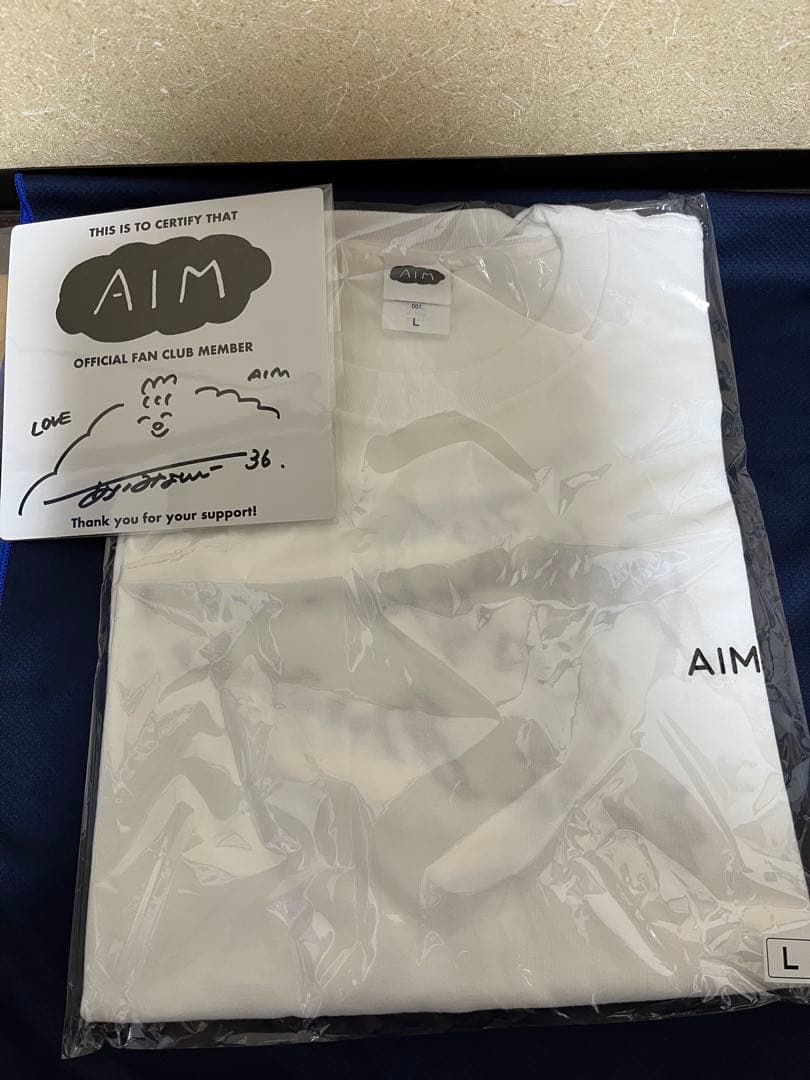 あいみょん 直筆サイン入りミニ色紙&AIM限定デザインTシャツ 【L】
