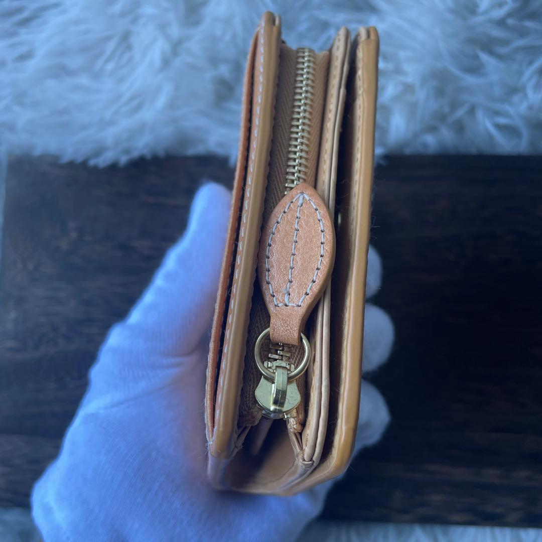 【極美品】ゲンテン フラッターカットワーク 二つ折り財布 ヌメベージュ