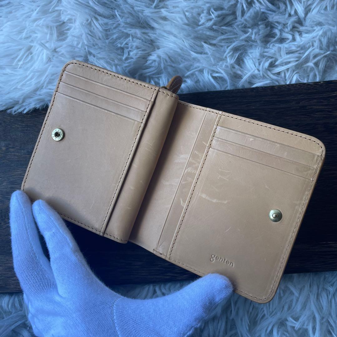 【極美品】ゲンテン フラッターカットワーク 二つ折り財布 ヌメベージュ