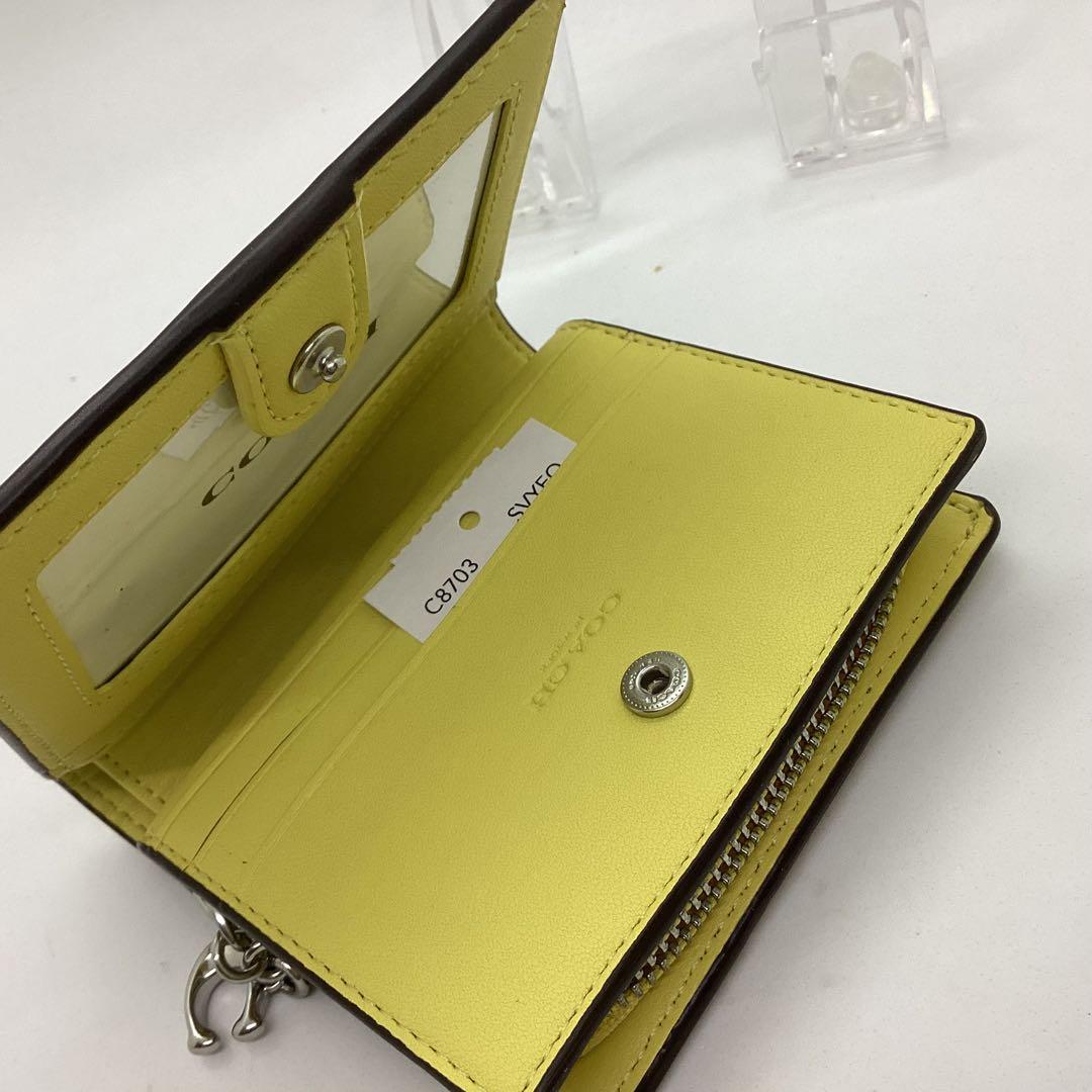COACH 花柄 二つ折り　コンパクト　財布 イエロー