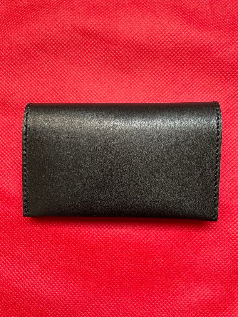 新品未使用 【OZIO】レザー名刺入れ ブラック/ターコイズ ペンギン柄