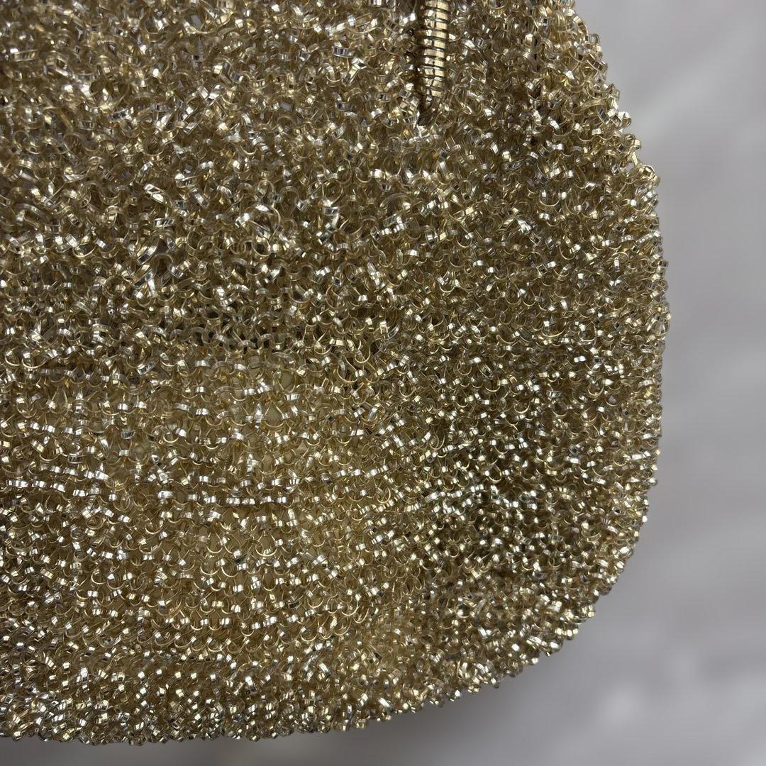 アンテプリマ　ワイヤーハンドバッグ　がま口　リボン　ゴールド