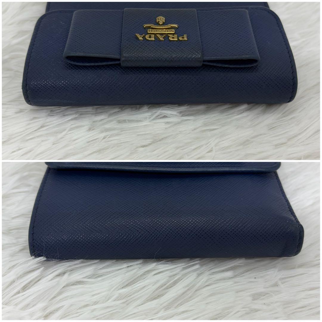 美品✨プラダ 三つ折り財布 財布 サフィアーノ レザー リボン ネイビー 紺