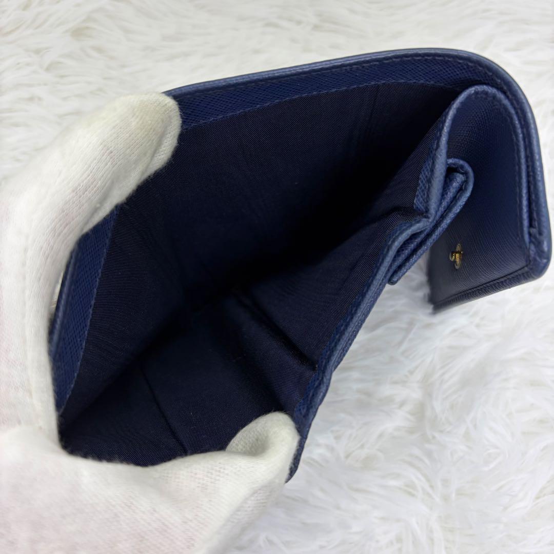 美品✨プラダ 三つ折り財布 財布 サフィアーノ レザー リボン ネイビー 紺