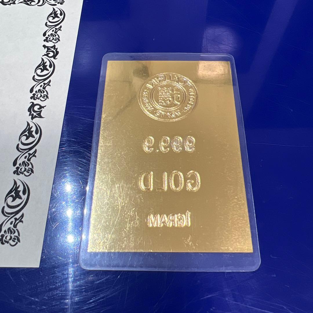 徳力・純金1g・ラミネート・保証書付き