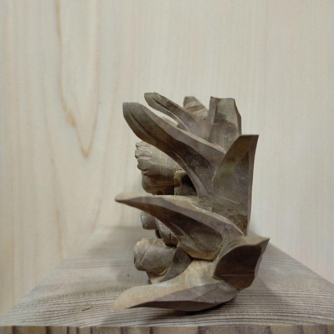 獅噛み白檀彫刻