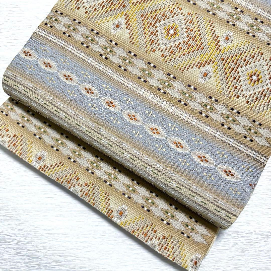 m-22 本場琉球 島花織 幻想雪輪文 袋帯 正絹 2通り 両面 未使用